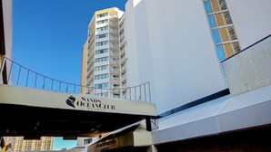 A multi-story building with a sign for Sands Ocean Club Resort. - Sands Ocean Club 1629 (Myrtle Beach)