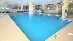 An indoor swimming pool with clear water, a 3ft depth marking, and a tiled floor. - Barefoot Livin' Retreat (North Myrtle Beach)