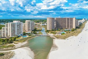 A coastal resort area with high-rise buildings, a beach, and a river. - Ocean Creek Unit PP3 (Myrtle Beach)