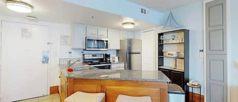 Coffee/tea maker, fridge, microwave, oven