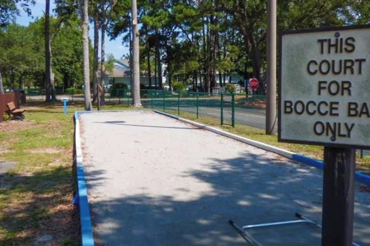 A parking area with a sign indicating it is for bocce ball only.