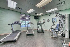 A gym with treadmills, elliptical machines, and weight equipment. - Tilghman Beach and Golf 6003 (North Myrtle Beach)