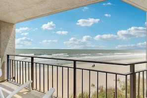 A balcony with a view of the beach and ocean. - Surfmaster by the Sea 208 (Murrells Inlet)