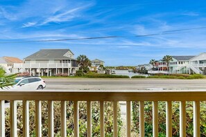 A coastal residential area with houses, a road, and a water body. - Ocean Boulevard Oasis (North Myrtle Beach)
