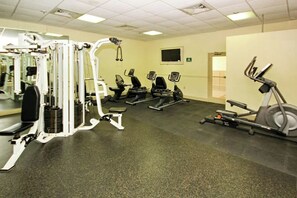 A gym with various exercise equipment including treadmills, elliptical machines, and weight machines. - Myrtle Beach Resort A-248 (Myrtle Beach)
