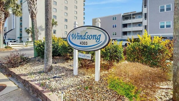 A sign for Windsong at 4303 with a 'No Golf Carts' notice. - Windsong Unit 303 Condo (North Myrtle Beach)