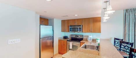 Coffee/tea maker, fridge, microwave, oven
