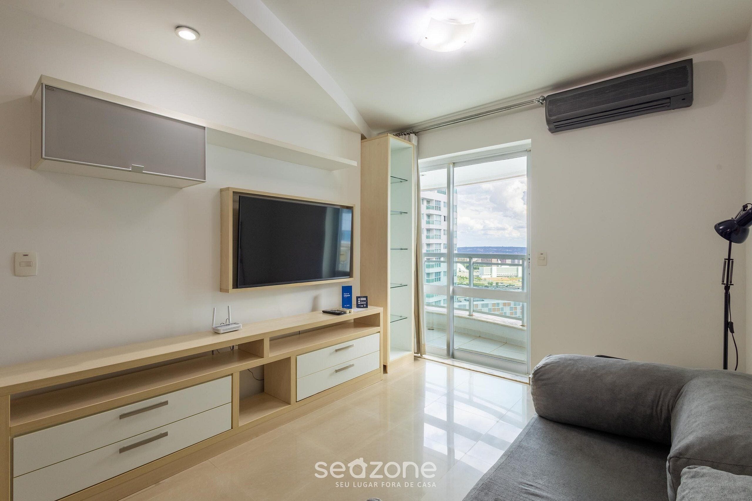 Basic Apartment | Living area | 40-inch TV with digital channels