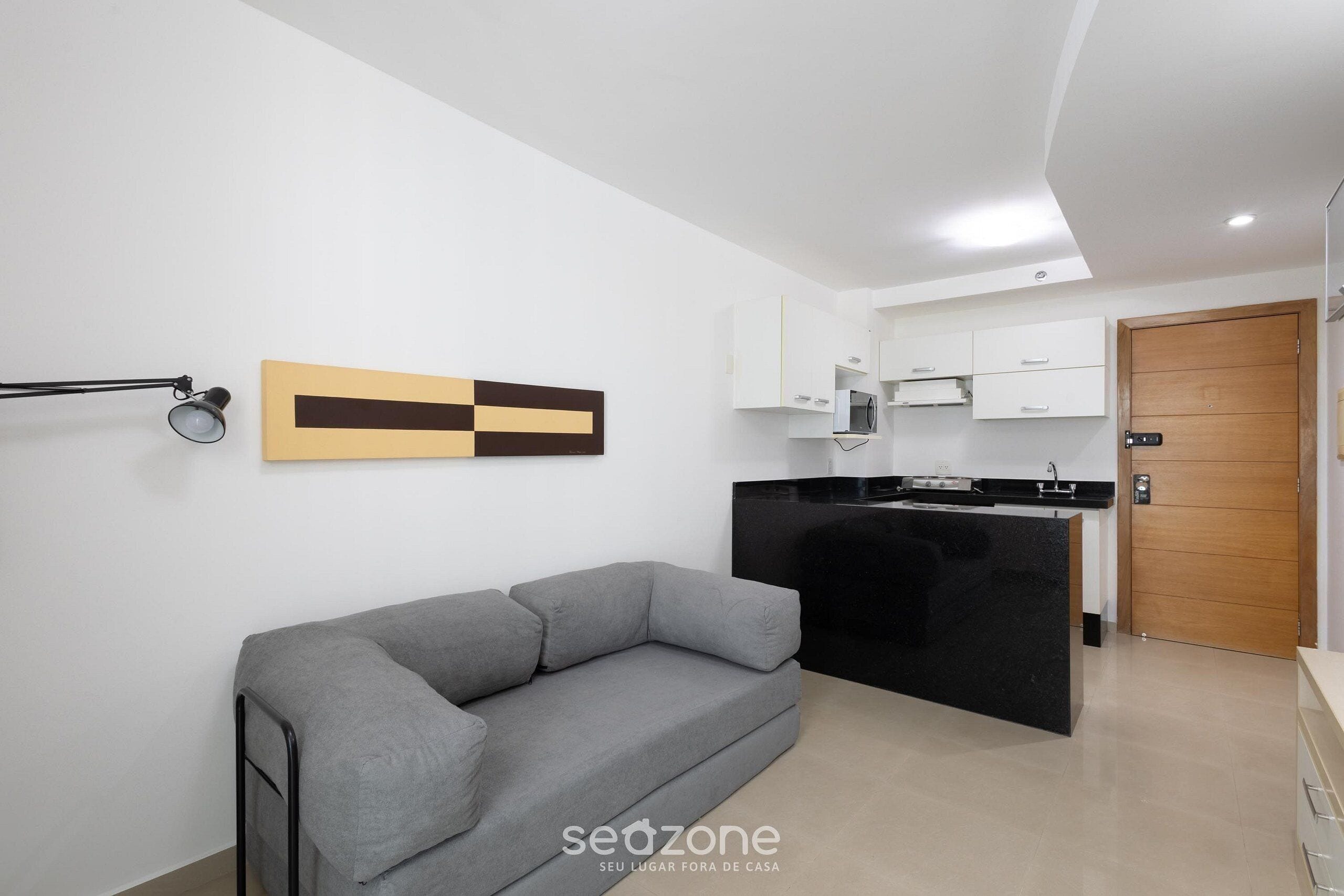 Basic Apartment | Living area | 40-inch TV with digital channels