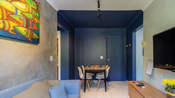 Basic Apartment | Living area | 40-inch TV with digital channels