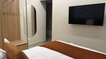 2 habitaciones, tabla de planchar con plancha, wifi y ropa de cama