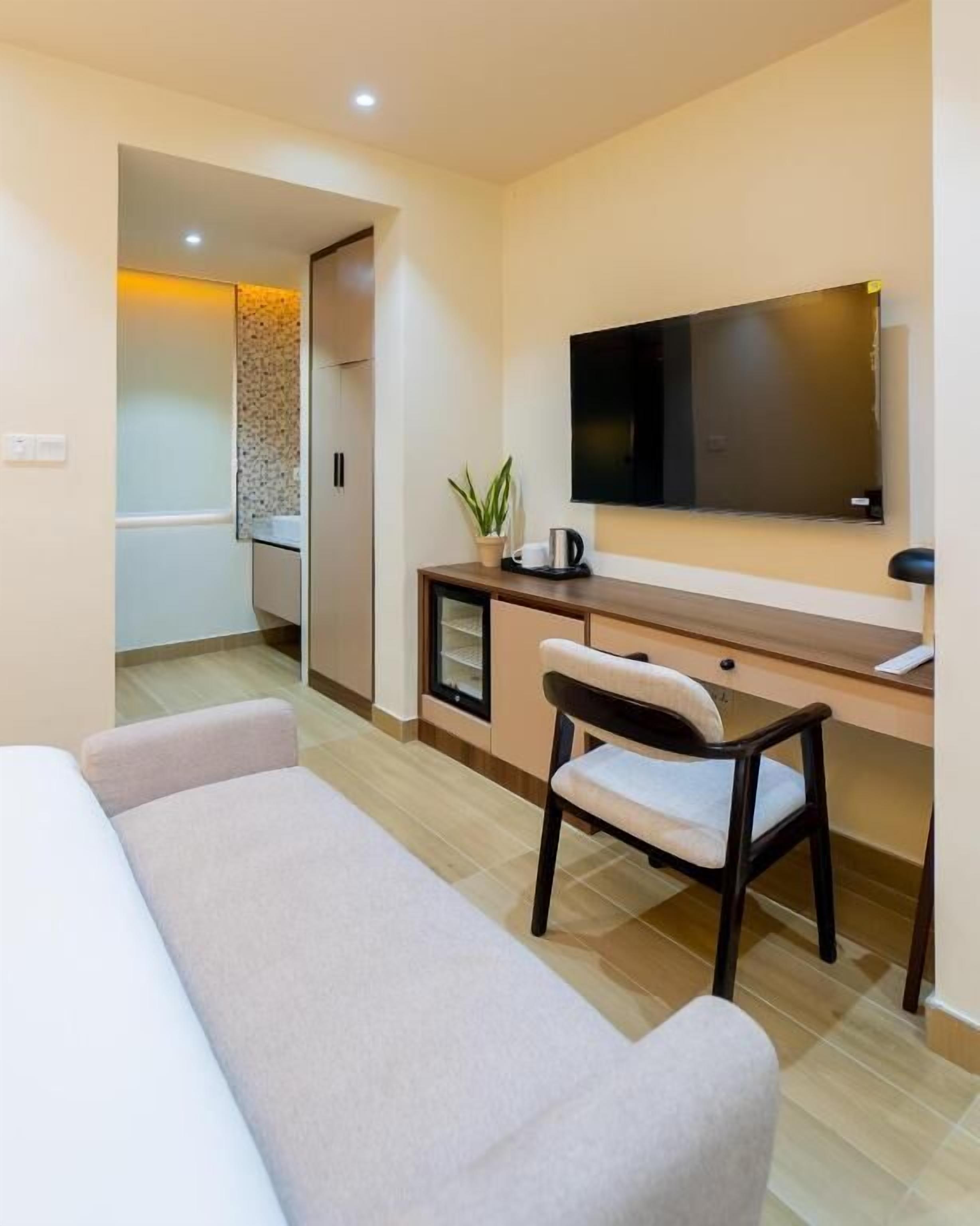 Suite familiar, vistas al jardín | Zona de estar