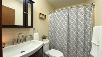 Hair dryer, towels, soap, toilet paper