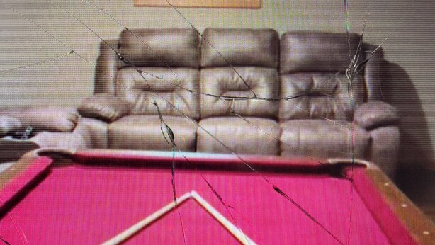 A pool table with a red felt surface and a collection of billiard balls. - Cabin 38 miles from Beach Mountain ski resort 5 miles from the lake in winery (Butler)