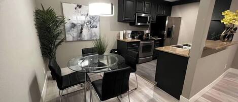 Coffee/tea maker, fridge, microwave, oven