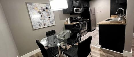 Coffee/tea maker, fridge, microwave, oven