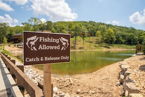 A sign indicating fishing is allowed with catch and release only.