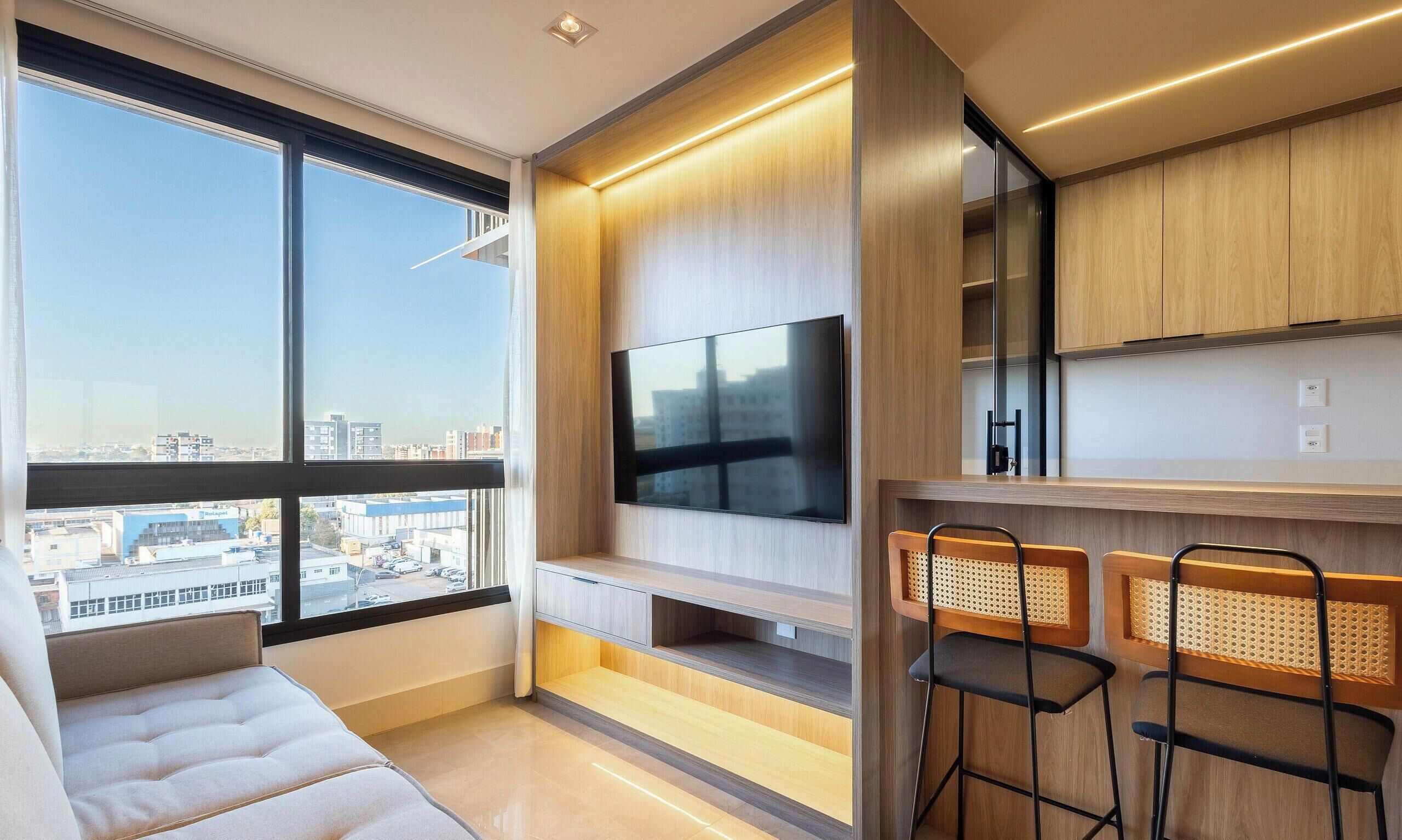Apartamento básico | Área de estar | TV 40 polegadas com canais digitais