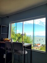 Suíte conforto, vista para o mar | Opções para refeição