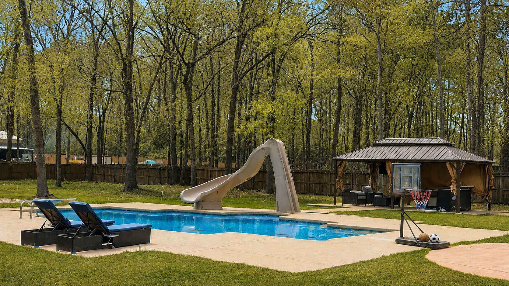 Un jardin avec une piscine, un toboggan, des chaises longues et un petit pavillon.