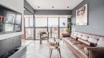 Apartamento, vista para o pátio | Área de estar