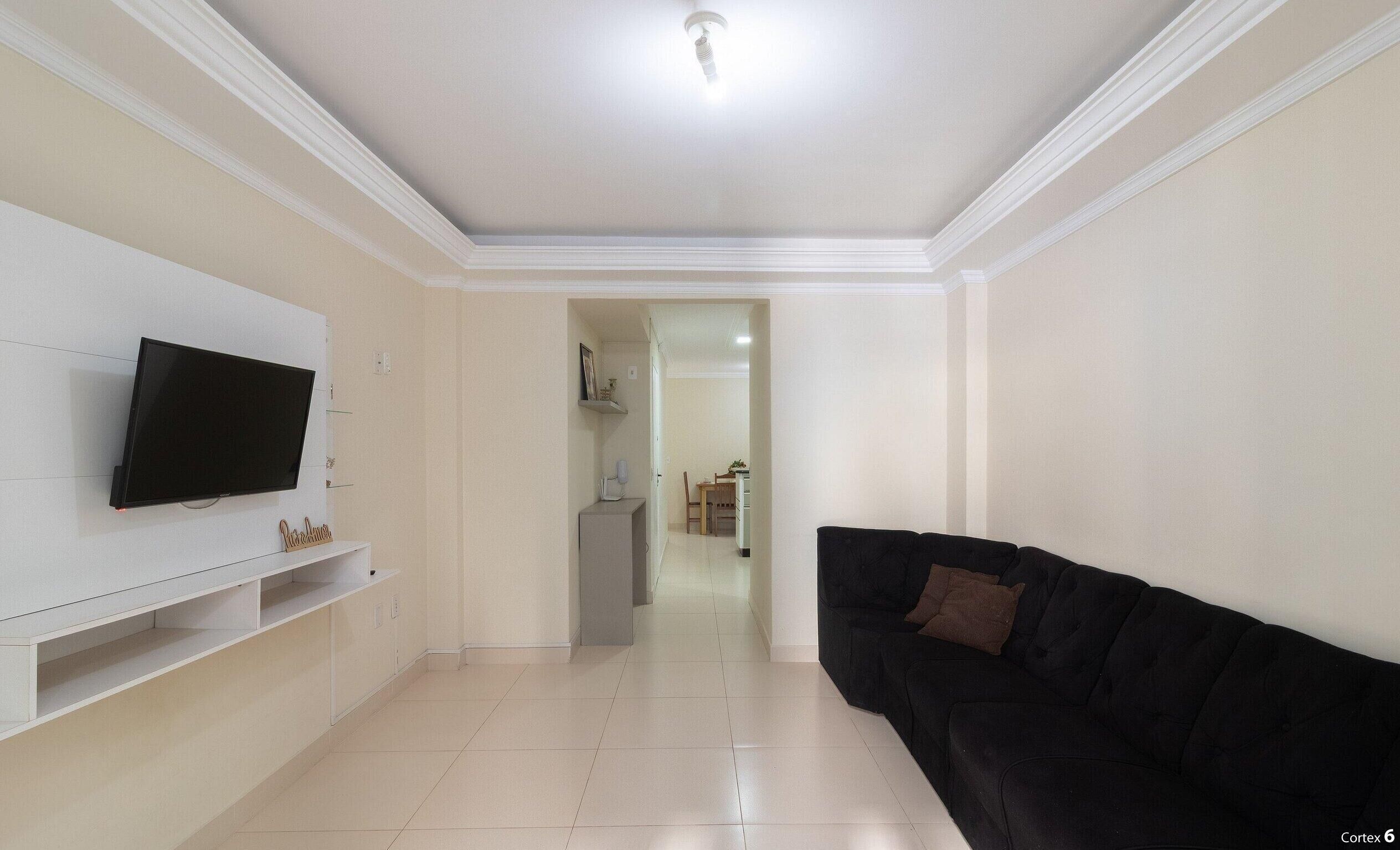 Basic Apartment | Living area | 40-inch TV with digital channels