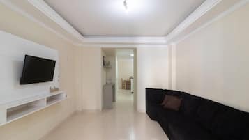 Basic Apartment | Living area | 40-inch TV with digital channels