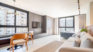 Basic Apartment | Living area | 40-inch TV with digital channels