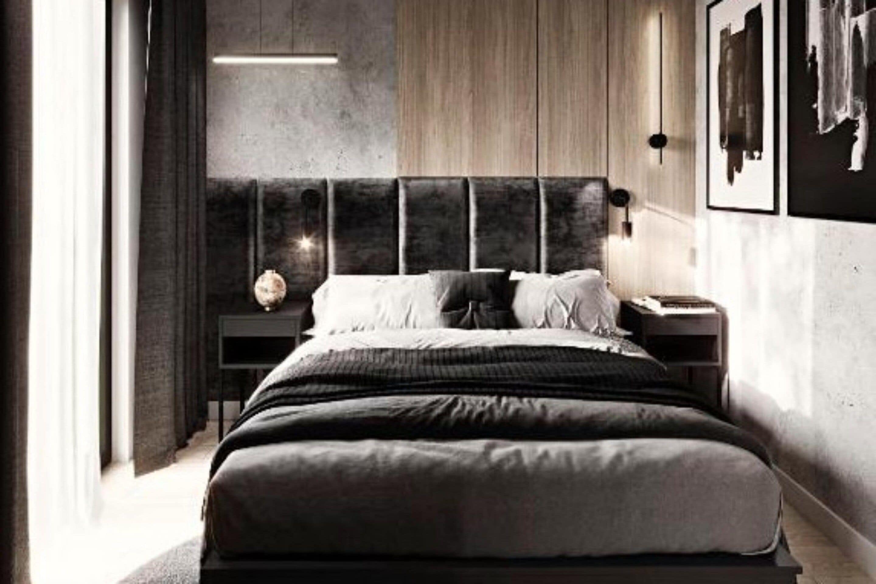 A modern bedroom with a large bed, a bedside table, and a nightstand.