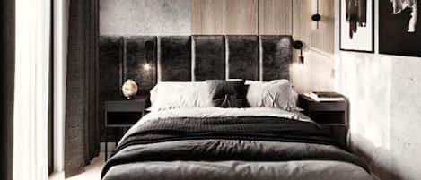 A modern bedroom with a large bed, a bedside table, and a nightstand.