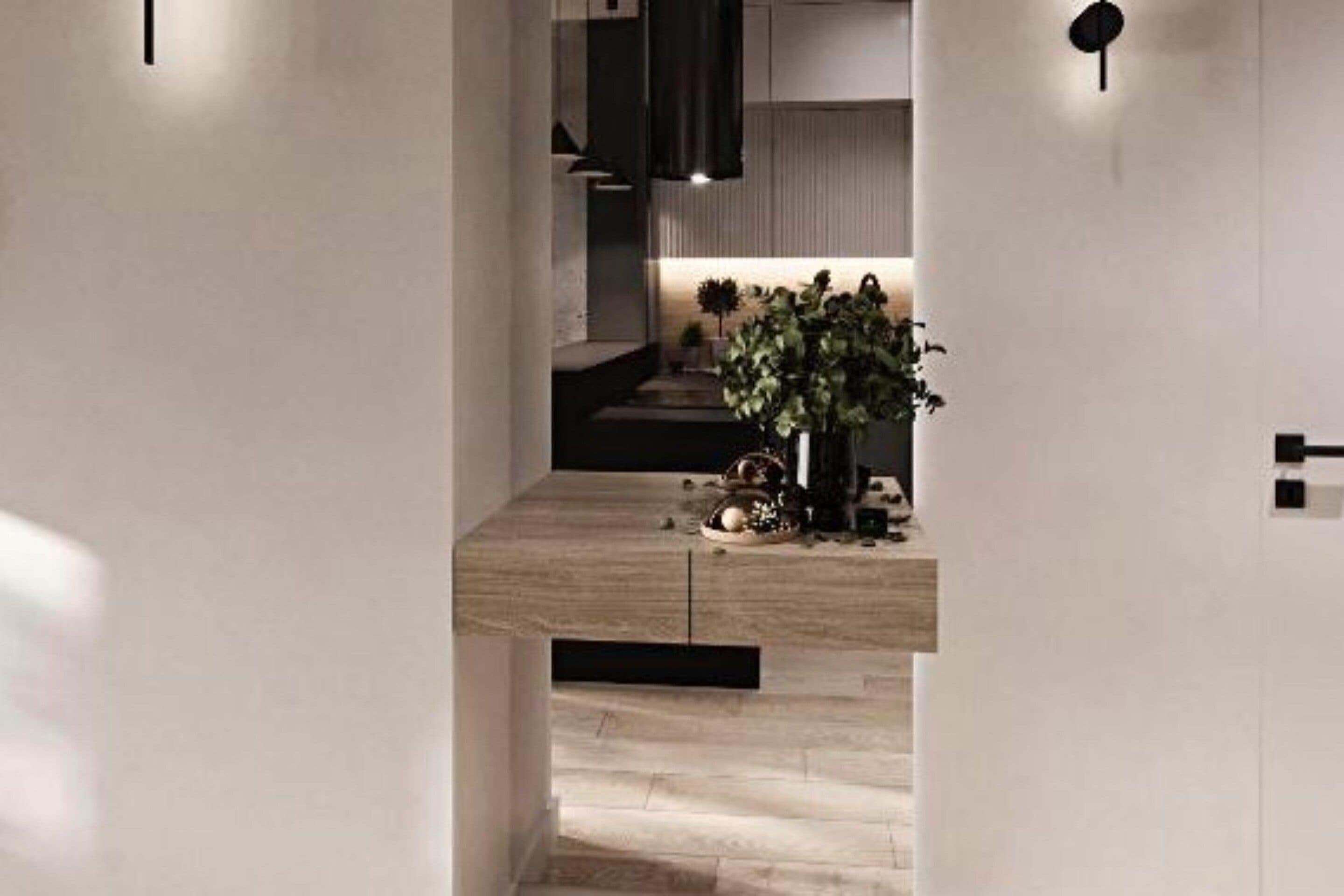 A modern interior with a wooden floor, a plant, and a minimalist design.