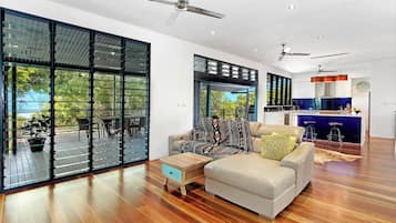Casa família, vista para a praia | Área de estar