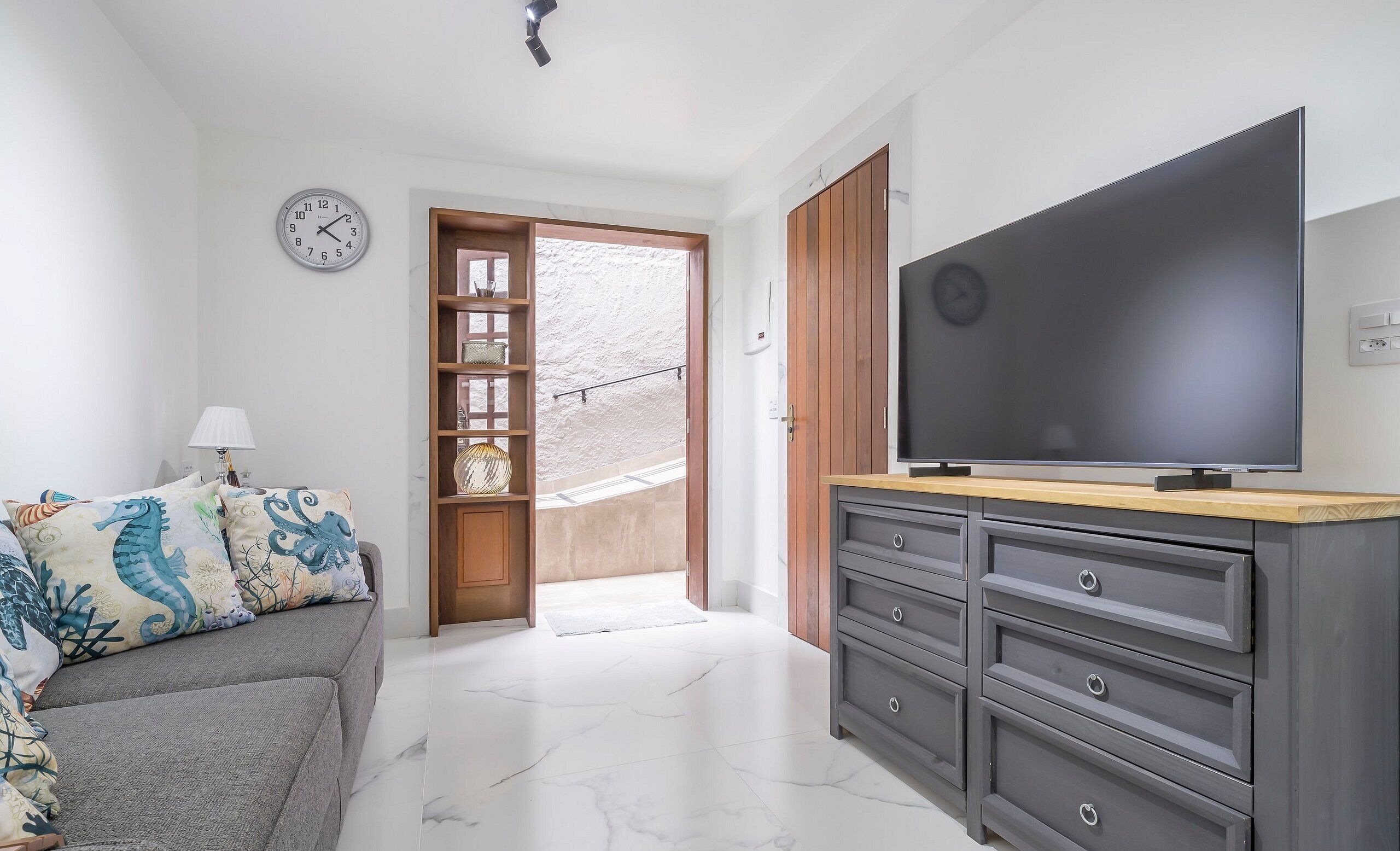 Basic Apartment | Living area | 40-inch TV with digital channels