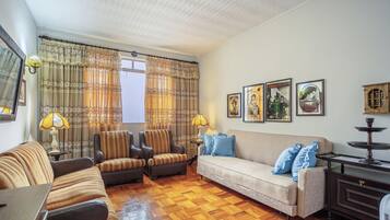 Basic Apartment | Living area | 40-inch TV with digital channels