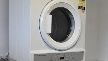 Shower, towels, soap, toilet paper