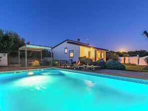 A swimming pool with a house in the background. - Villa Demian by Interhome (Pula/Banjole)