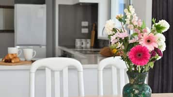 Coffee/tea maker, fridge, microwave, oven
