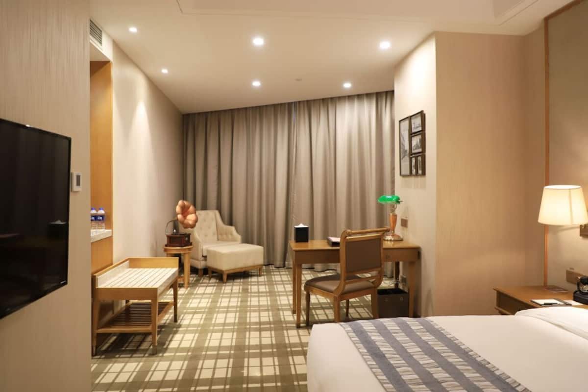 In-room safe, desk, laptop workspace, blackout curtains