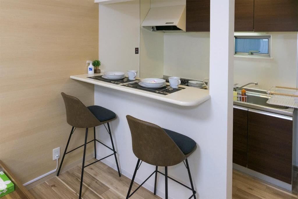 Habitación Deluxe | Cocina privada | Frigorífico, microondas, placa de cocina y utensilios de cocina