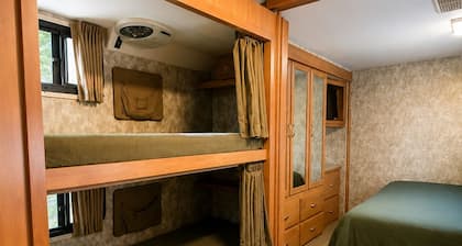 A cozy RV getaway in Stafford Springs. Escape the noise and drift into nature.