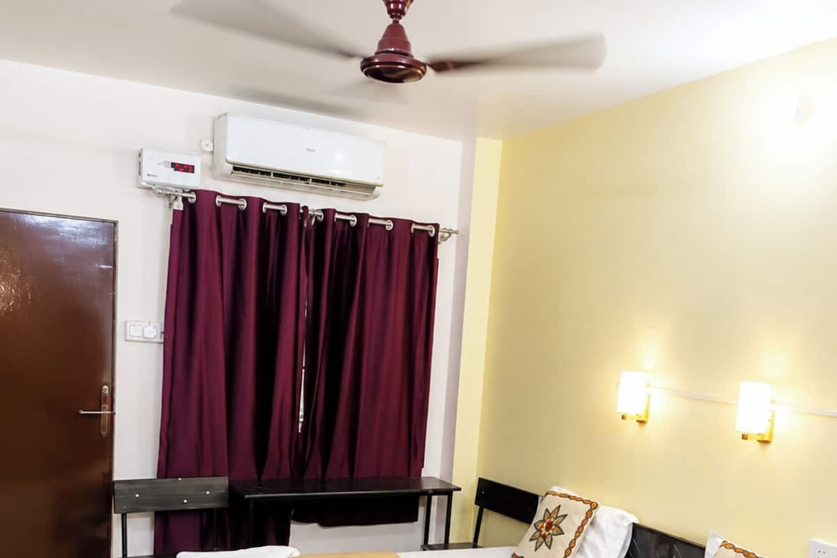 Habitació doble Deluxe, diversos llits, aire condicionat | Vista des de l'habitació
