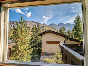 A mountain view with a cabin labeled 'Hermannshus' and a stone staircase leading to it. - Chalet Steinbock by Arosa Holiday Appartement/Fewo, Bad, WC, 3 Schlafräume by Interhome (Arosa)