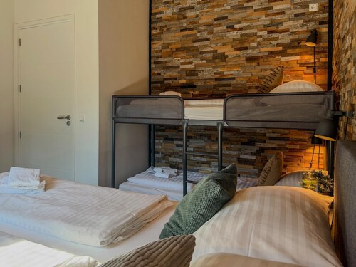 Spacious holiday apartment by a lake in the Alps