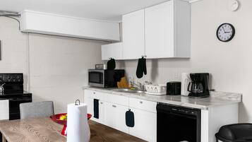 Start your day with coffee or wind down with a home-cooked meal—Unit B's kitchen comes ready with the appliances and essentials you need.
