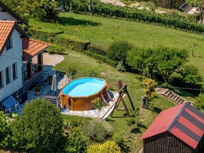 A residential property with a swimming pool, a wooden deck, and a well-maintained garden. - House Sofija by Interhome (Vrtlinovec)