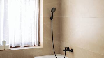 Hair dryer, towels, soap, shampoo