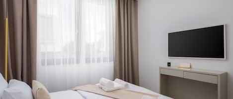 2 bedrooms, in-room safe, iron/ironing board, travel cot