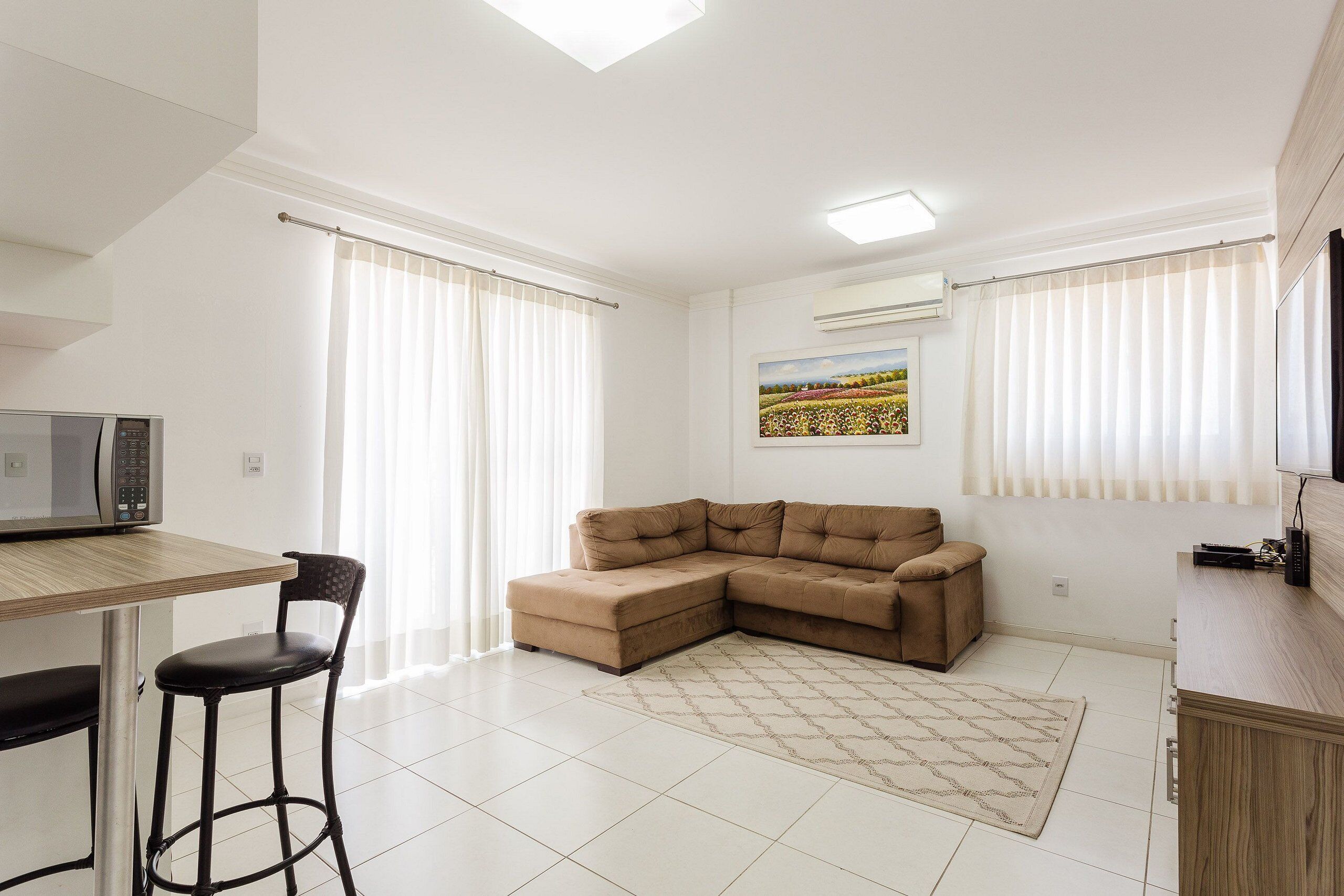 Basic Apartment | Living area | 40-inch TV with digital channels
