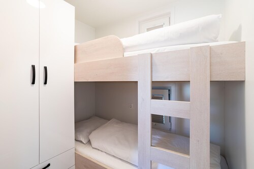 Houseboat with terrace by the sea