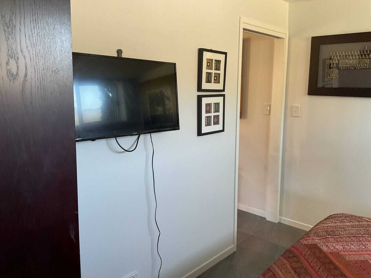 Desk, iron/ironing board, bed sheets